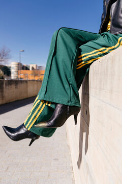 Ahleisure track pants with elegant boots