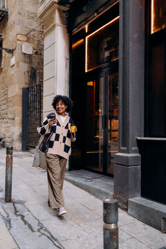 A woman using a mobile phone in the city