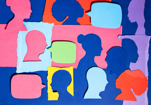 Colorful Paper Silhouettes With Speech Bubbles on a Blue Backdrop