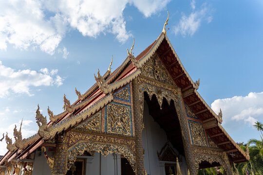 Traditional Thai Temple Architecture in Bright Sunlight