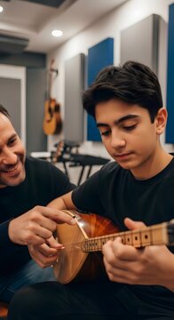 Music teacher mentoring student playing turkish baglama saz