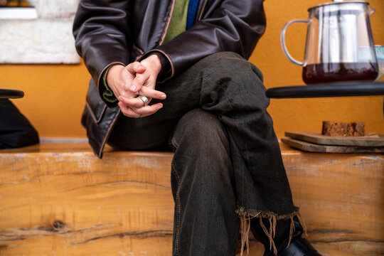 A woman in a yellow cafe