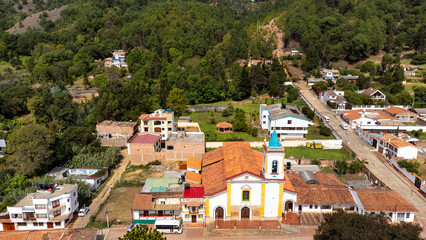 Fototapeta premium Tinjacá, Boyacá - Colombia. March 10, 2026. Panoramic drone view of the town's main church.