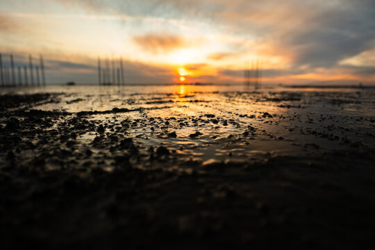 Wet Concrete Surface at Sunset