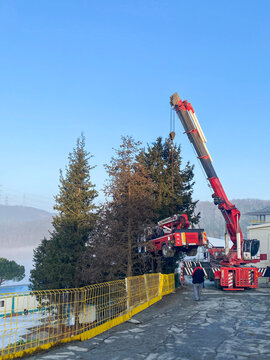 Transport of Small Truck Crane with Giant Mobile Crane at Site