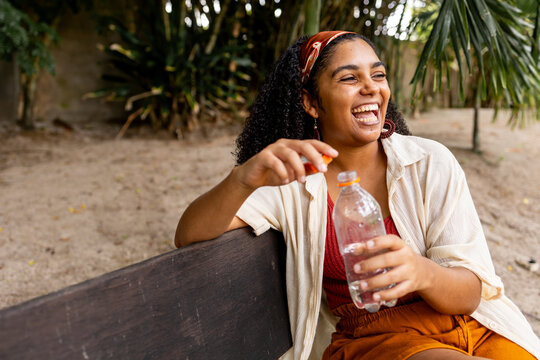 Woman holding a bottle of water