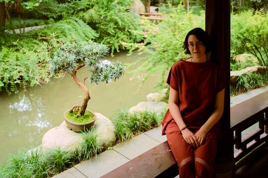 Enjoying a Moment by the Garden Pond in Chengdu, China