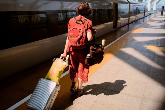 Travel Journey at Guangzhou Train Station With Bags