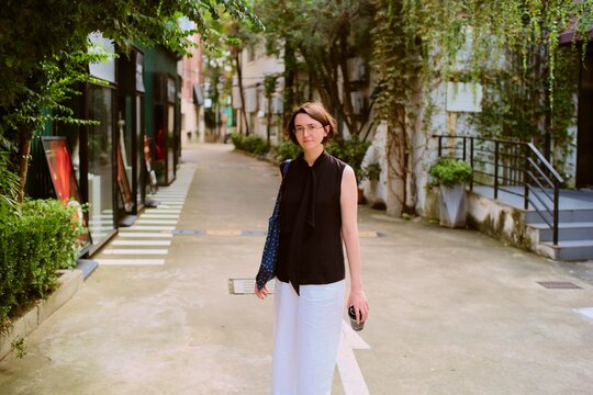 Exploring Narrow Streets in Shanghai Art District During a Warm Day