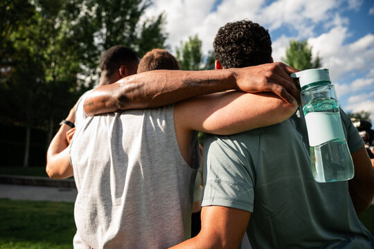 Friends embracing in nature