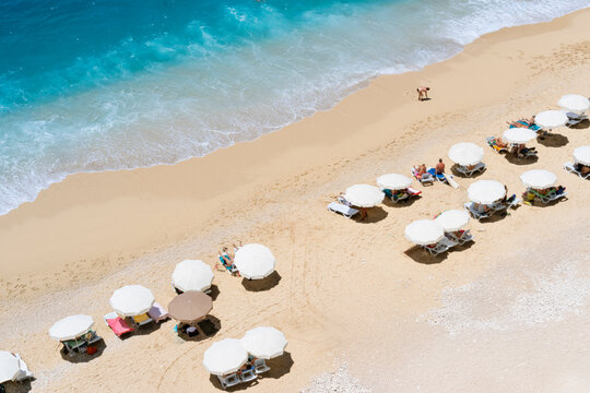 High angle view of Kaputaş Beach, Kaş, Turkey with people sunbathing