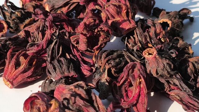 Dried rosella flowers with deep red tones, known for their natural health benefits, rich in antioxidants and commonly used to support immunity and overall wellness.