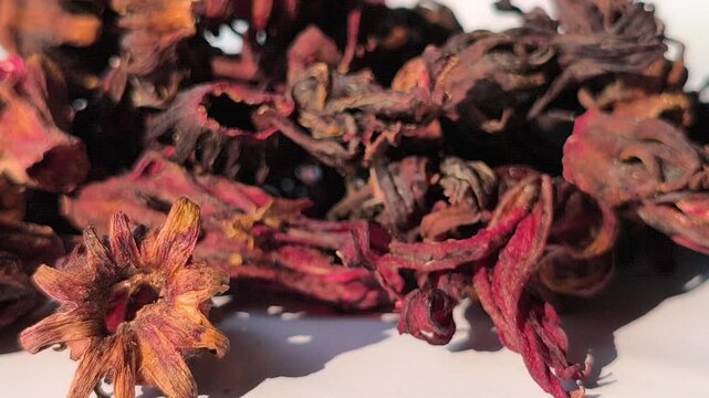 Dried rosella flowers with deep red tones, known for their natural health benefits, rich in antioxidants and commonly used to support immunity and overall wellness.