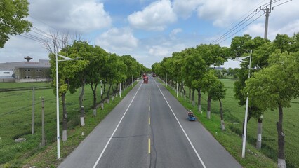 Fototapeta premium A tree-lined country path in rural Changshu