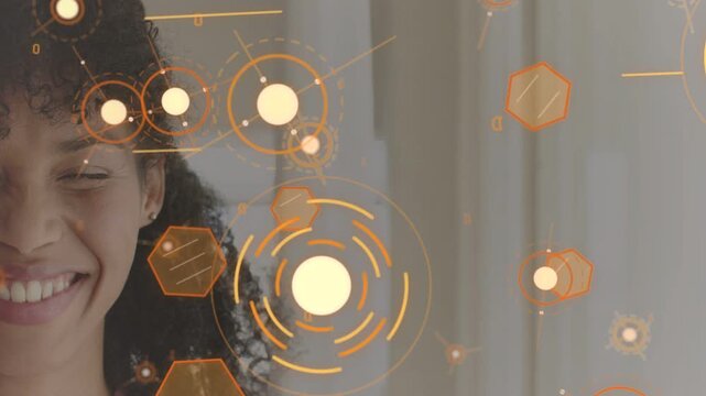Woman smiling then laughing as animated orange HUD ring appearing near cheek, causing AR response