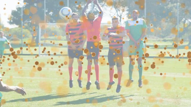 Wall jumping to block free kick while kicker running and striking ball, sports overlay hiding goal