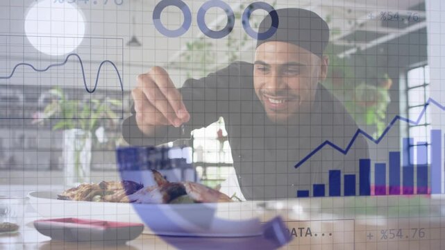 Man leaning and sprinkling garnish at kitchen table activating waveform charts analysing food data