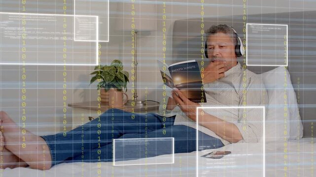 Mature man reclining on bed reading while grid initiating UI overlays framing book for tech demo