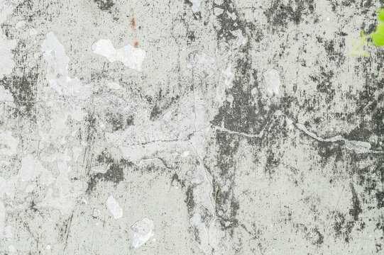Textura de pared de concreto envejecido con grietas, manchas y desgaste natural