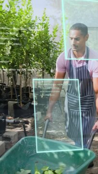Vertical video: Man entering nursery pushing barrow tending plants, AR overlay overlapping barrow
