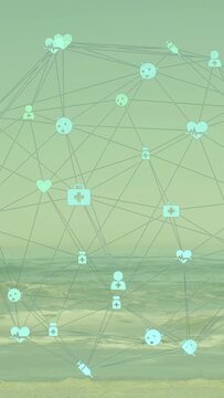Vertical video: Sheer teal network dome responding to waves, shifting icons to show medical links