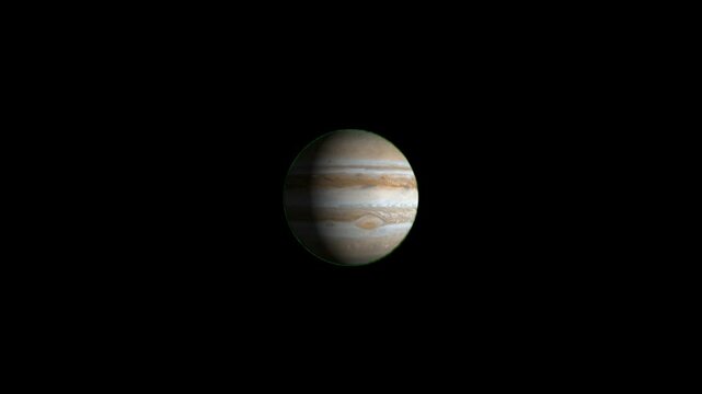 A slow rotation of the planet jupiter isolated against a solid black background