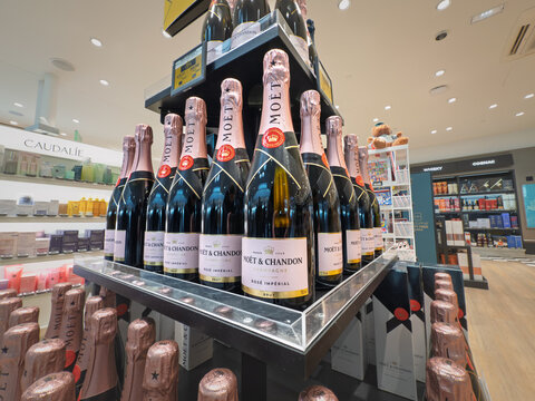PARIS, FRANCE - MARCH 6, 2026: Display of Moet & Chandon Rose Imperial champagne bottles in a store in paris. Moet et Chandon is a French brand of luxury champaign champagne part of Moet Hennessy.
