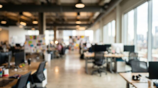 Neutral bright modern office interior with bokeh, blurry workplace background