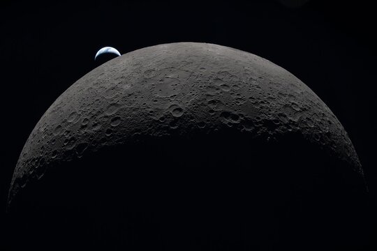 Earthset captured through the Orion spacecraft window, during the Artemis II crew&rsquo;s flyby of the Moon. "Elements of this Image Furnished by NASA"	