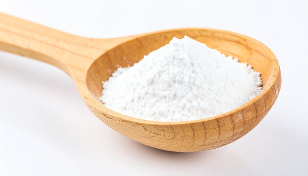 A wooden spoon filled with a mound of fine white cornstarch on a white background