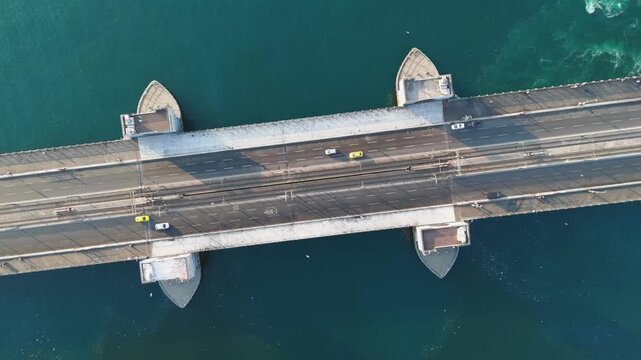 Istanbul, Turkey. Top down aerial view of Galata Bridge crossing Golden Horn inlet in Fatih district at morning sunlight. Aerial View, HEAD OVER SHOT