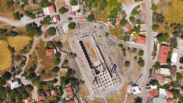 Didim, Turkey. Aerial drone flight over the ancient Temple of Apollo at Didyma, view of massive columns and ruins. Aerial View, HEAD OVER SHOT with rotation