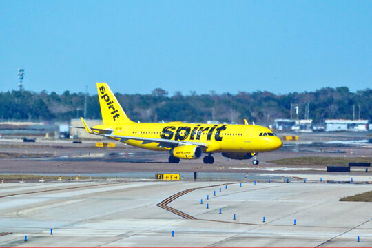 A Spirit Airlines airplane taxis after landing at Orlando International Airport Orlando, Florida on January 19, 2026.