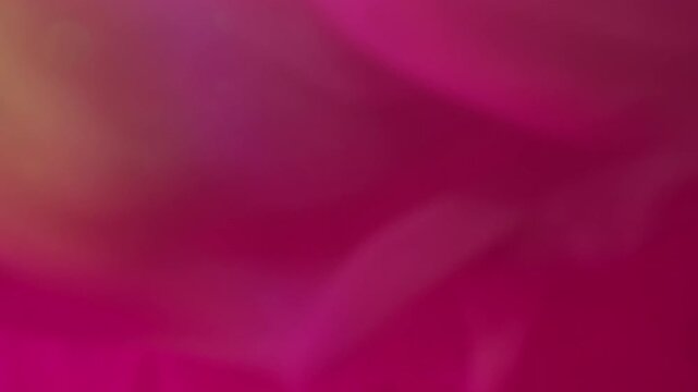 Vertical video. Mist mix. Cloud texture. Defocused pink blue green color ink glitter flow wave water broken light bulb spreading on abstract bokeh background.