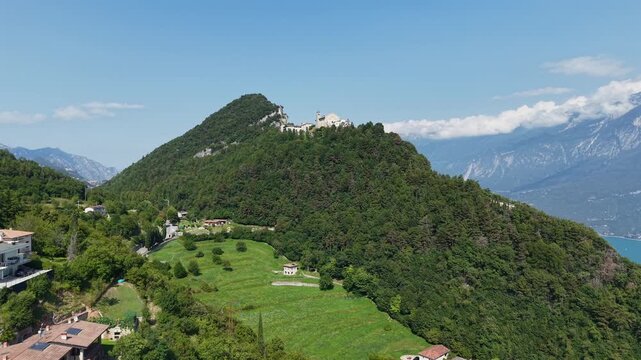 Italian beauty: Montecastello Sanctuary suspended over Lake Garda, professional aerial drone footage.
