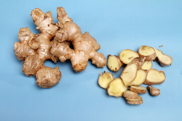 Fototapeta premium ginger root on a wooden background