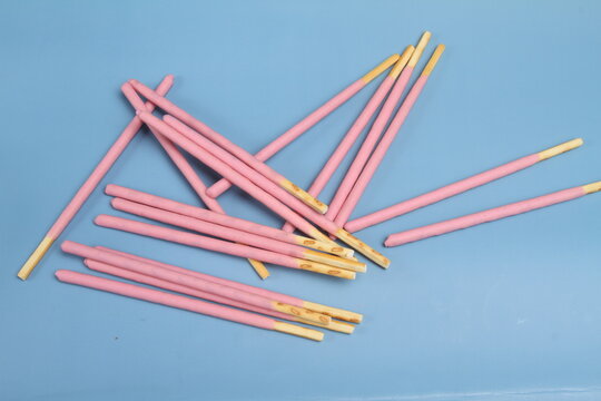 biscuits stick on blue background