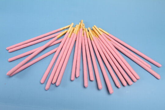 creamy biscuits stick with blue background