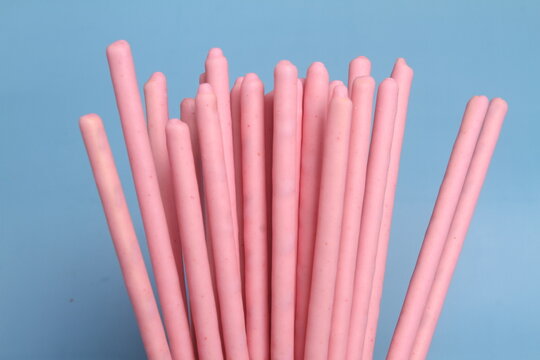 creamy biscuits stick with blue background