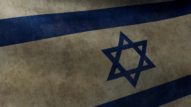 Close-up of the fluttering flag of Israel with well-worn fabric texture