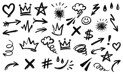 Fototapeta premium Collection of hand drawn black graffiti brush elements including heart, crown, star, arrow and abstract symbols.
