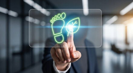 Fototapeta premium Hand interacts with virtual display glowing green leaf, carbon footprint. Represents corporate environmental responsibility and sustainability