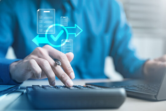 User completing refund transaction on calculator and laptop with digital interface, representing payment confirmation, financial processing, ecommerce refund system, and secure transaction.
