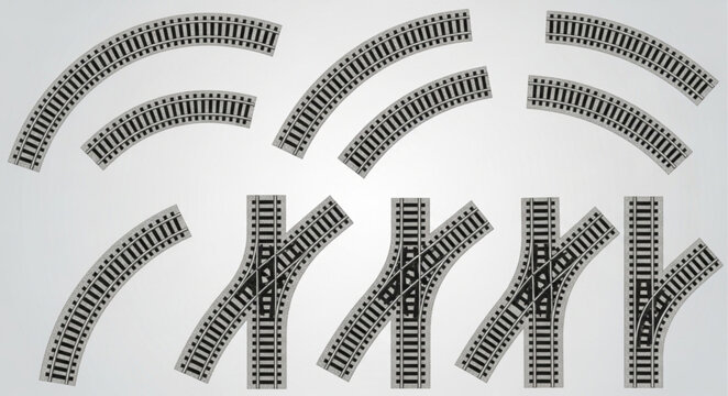 Collection of curved and straight railway tracks with switches.