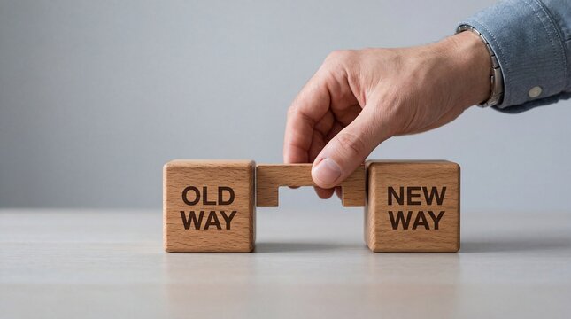 Business transformation concept with hand placing block from old to new way
