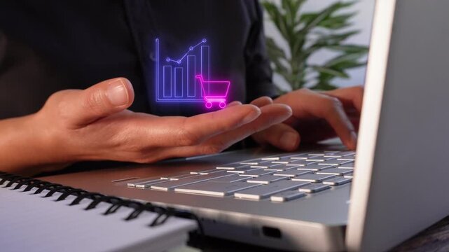 Sales and purchasing behavior analysis. Close-up of a businesswoman's hands working on her laptop while holding a virtual icon of a shopping cart chart.