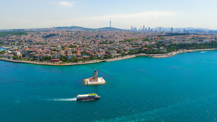 Istanbul, Turkey. Maiden Tower Kiz Kulesi on Bosphorus islet with water taxis and ferries navigating busy maritime corridor on sunny day. Aerial View © Video Render