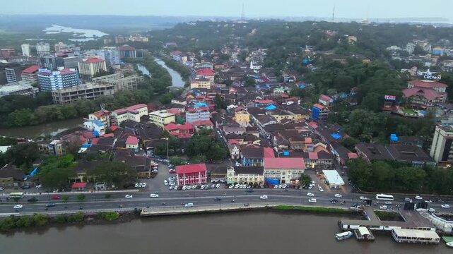 Aerial View of Mandovi River with Ferry and Panaji Cityscape Goa India