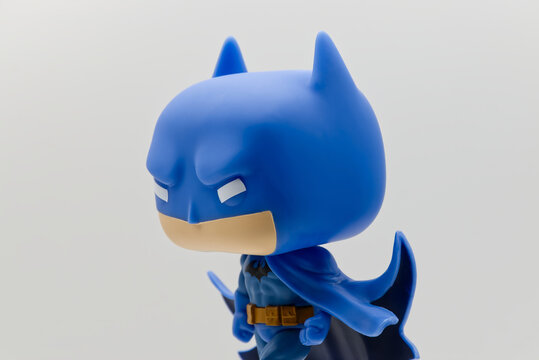 Bologna - Italy - February 15, 2026: Batman Funko Pop figure in blue suit isolated on white background.