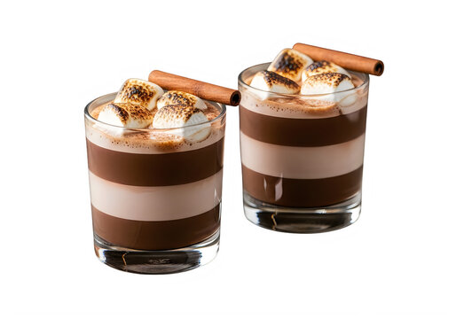 Two glasses of layered hot chocolate with toasted marshmallows and cinnamon sticks on top transparent background